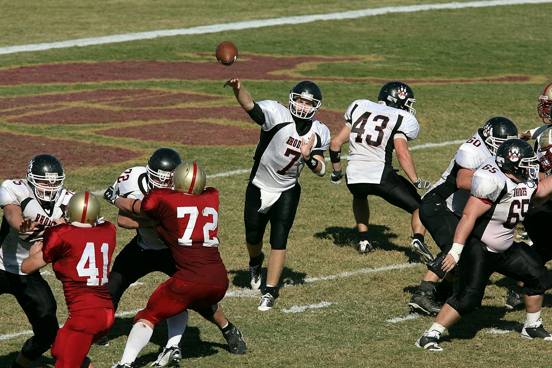 group of men playing football